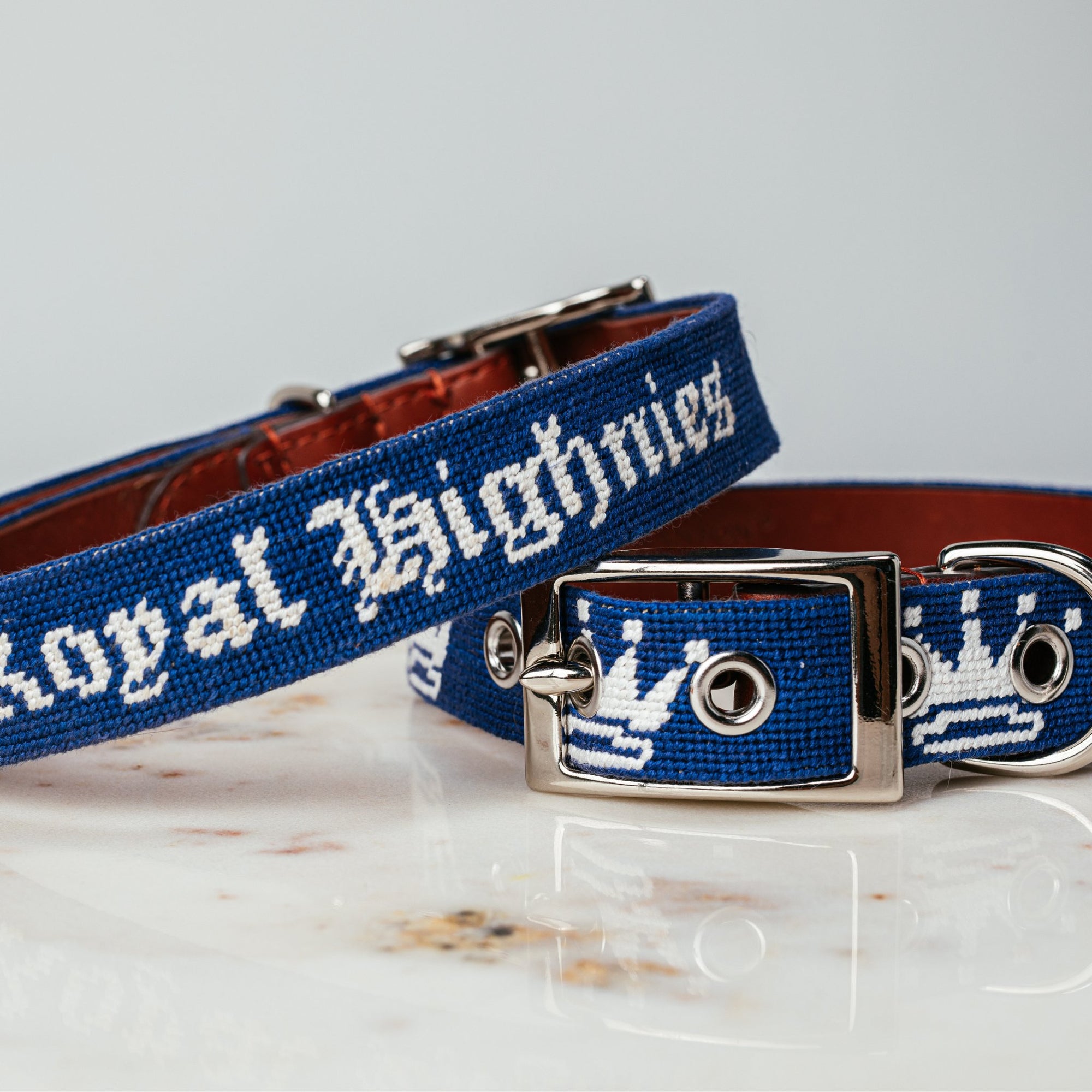 dog collars displayed on marble surface