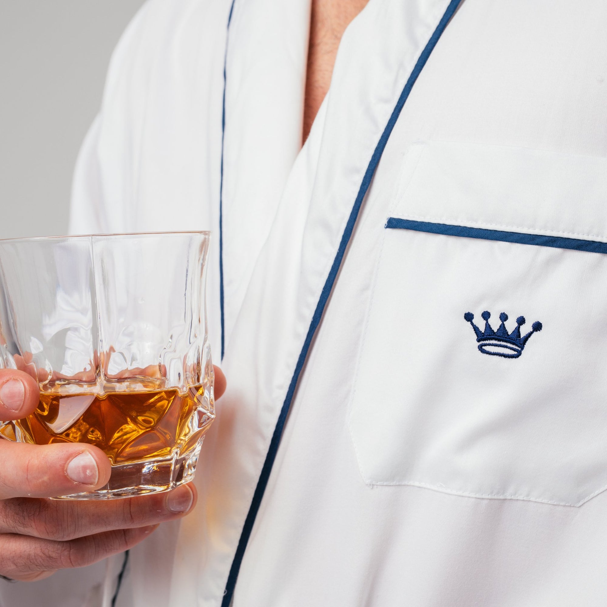 chest of rob showing rh decal with a glass of whiskey
