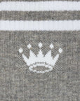 Gray sock with a white crown design and two white stripes