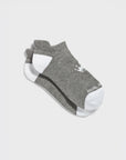 A pair of low-cut ankle socks in heather gray with white toes, heels, and soles, featuring a small white embroidered logo