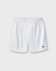White boxers with an elastic waistband and a small navy blue crown logo on the lower left leg, shown against a light gray background.
