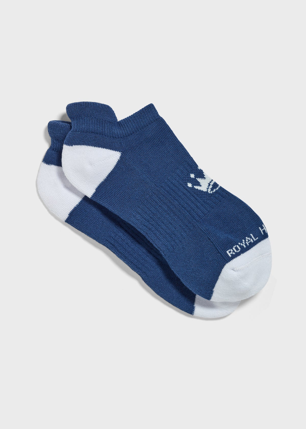 A pair of low-cut navy blue and white athletic socks with a small white crown logo