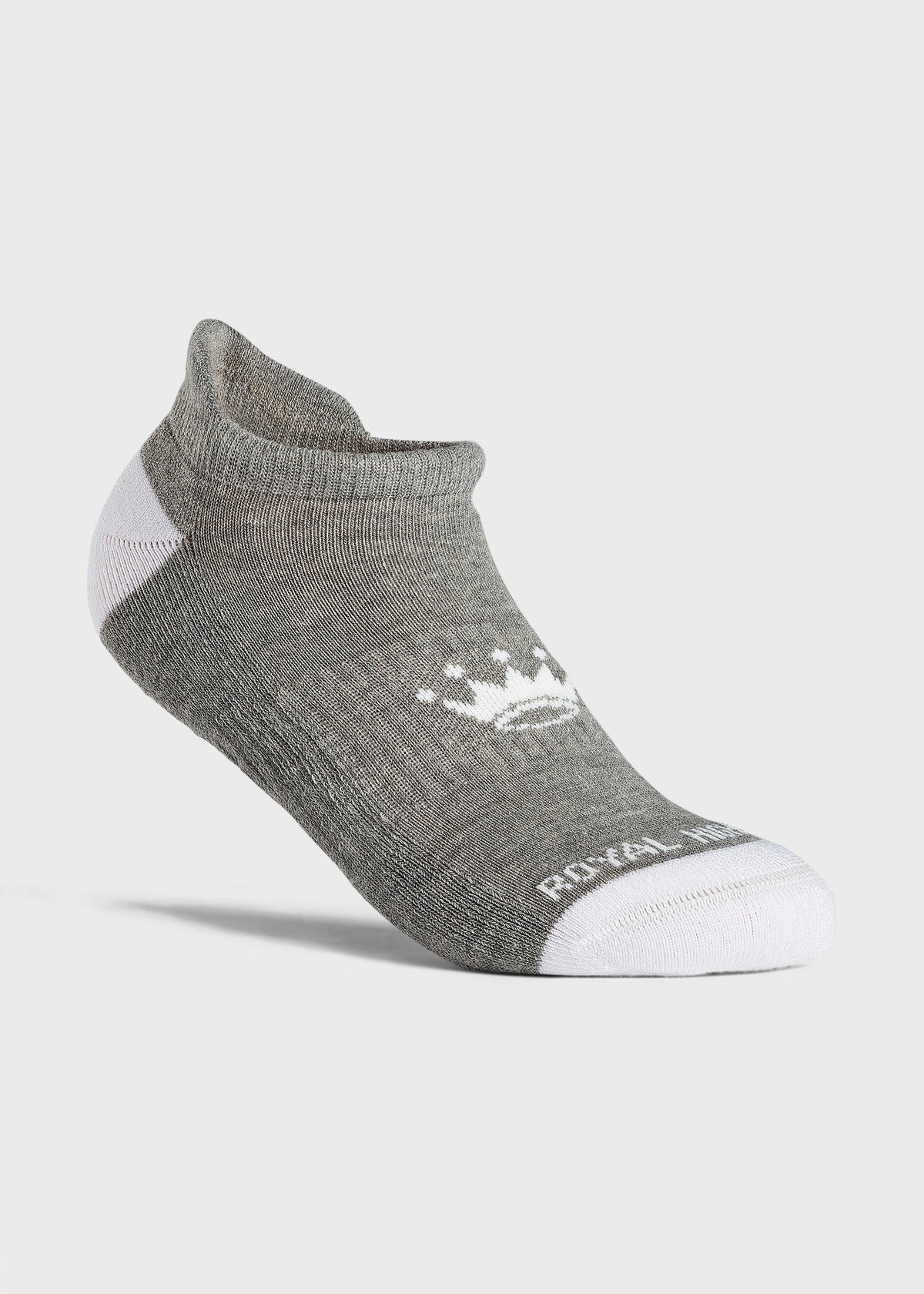 A single low-cut ankle sock in gray with white accents on the toe, heel, and back, featuring a white crown logo and 'ROYAL HIGHNIES' text on a light gray background.