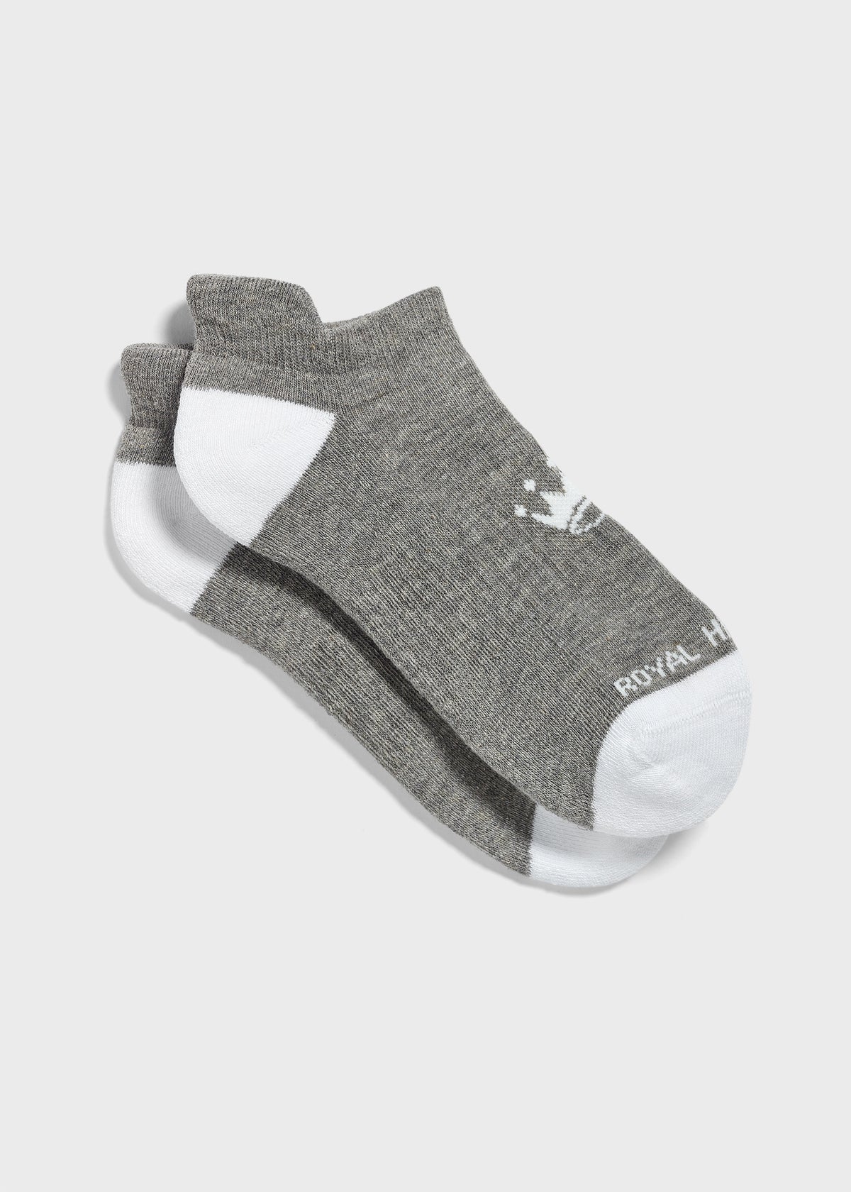 A pair of low-cut ankle socks in gray with white toes, heels, and cuffs, featuring a small white crown logo, displayed on a light gray background.