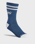 A single blue crew sock with white stripes, a white crown logo.