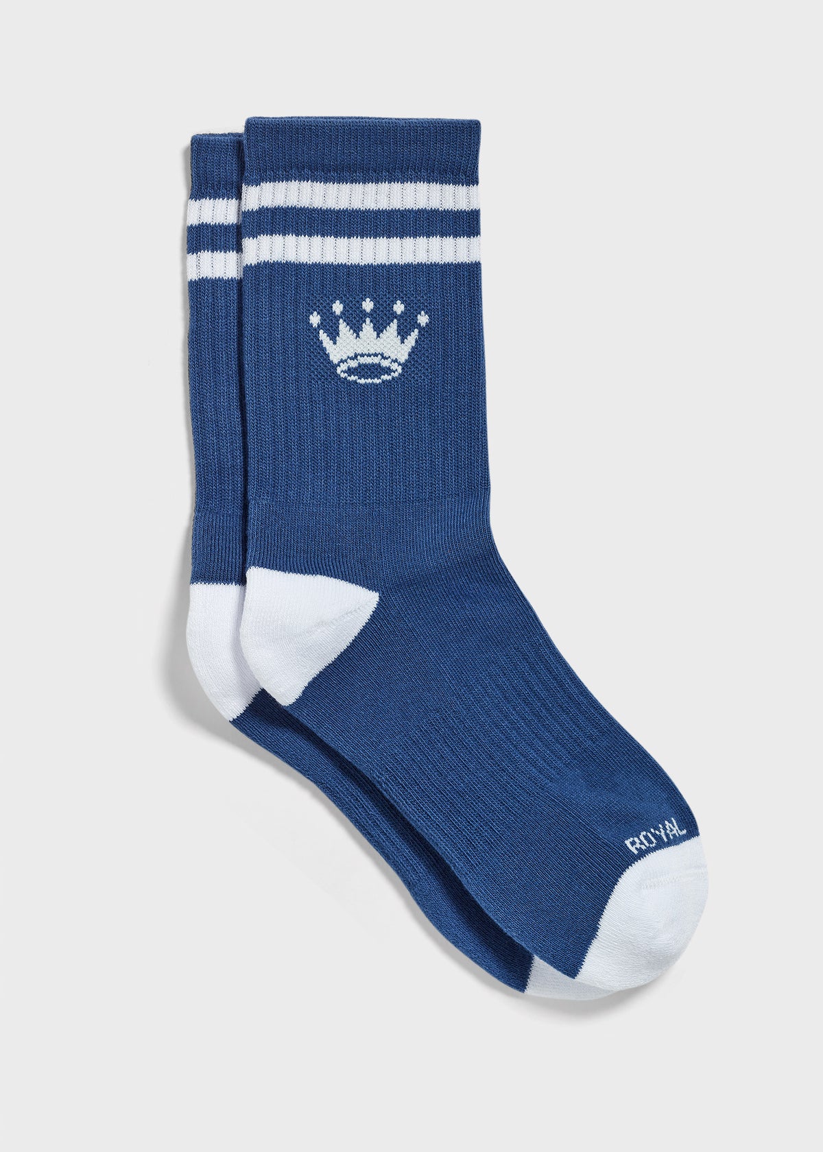 A pair of blue crew socks with white stripes on the cuff, a white crown logo, and white toe and heel sections.