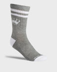 A single gray crew sock with white stripes, a white crown logo.