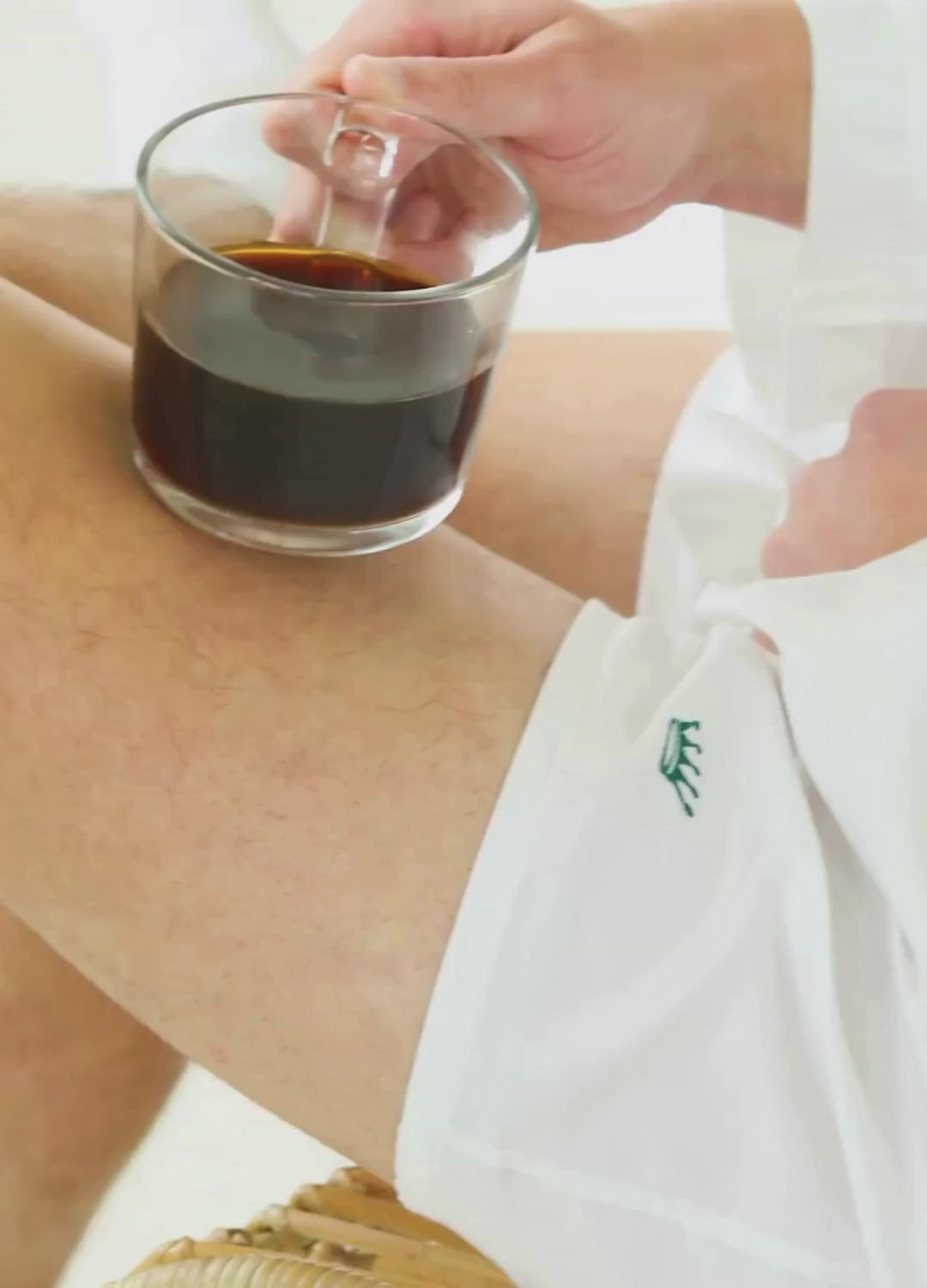 Short video clips showing a person wearing white boxer shorts with green embroidery