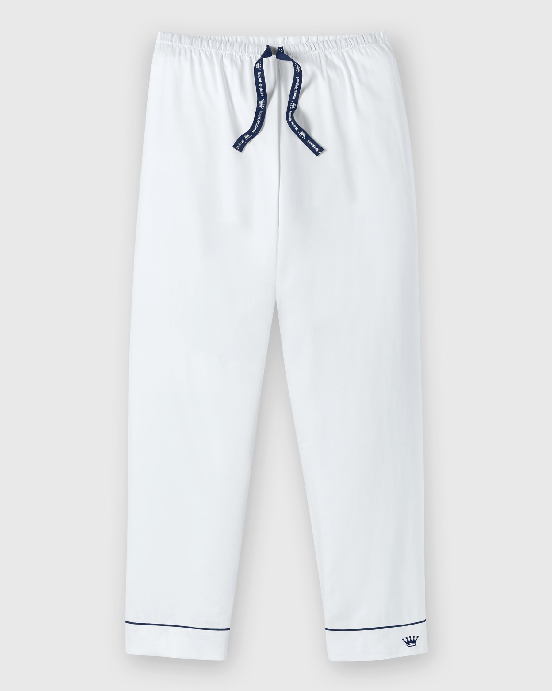 White lounge pants with a navy blue drawstring featuring white lettering, and navy blue piping details on the cuffs, shown against a light gray background.
